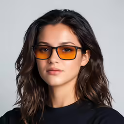the woman is wearing a black shirt and glasses