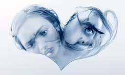 two people with their faces shaped like a heart
