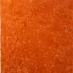 the tennis court has a red stain all over it