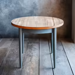 a table that has a wooden top on a wooden floor