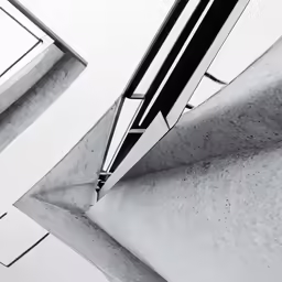two abstract buildings standing next to each other