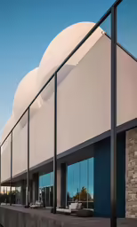 an empty outdoor lounge with windows