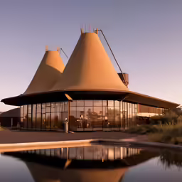 the two buildings are all shaped like cones