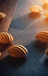 several small wooden spoons laying on a table