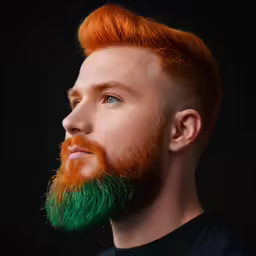 a red headed man with a red and green beard