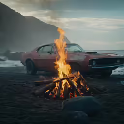 the fire pit in front of a parked car