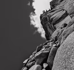 a long climb is shown against a dark sky