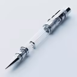 a pen is sitting on top of a white table