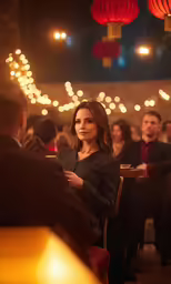 a woman sitting at a table in a restaurant