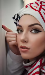 a woman in a headscarf is posing for a photo