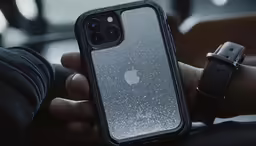 someone holding an apple phone in their hand