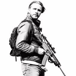 a man holding a rifle with an awg in his hand