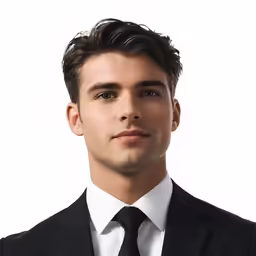 an individual dressed in a black suit and white shirt