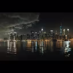 a city skyline illuminated in bright light at night