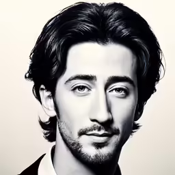 a man with long hair and a beard stares into the camera