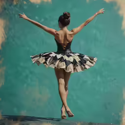the woman is wearing a black and white dress with geometric patterns