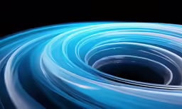 a close up of a blue and white swirl
