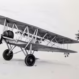 an airplane that is sitting in the snow
