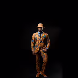 an african man dressed up in an odd suit and hat,a man is posing for a studio shot in a suit