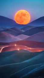 a bright orange full moon rising over mountains in the distance