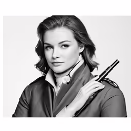 a woman posing with an umbrella in her arms