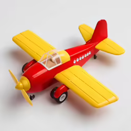 a small red and yellow airplane model on white
