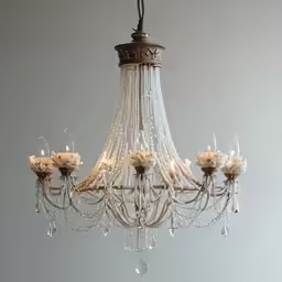 a crystal chandelier that is all lit