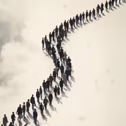 a group of people who are walking across the snow