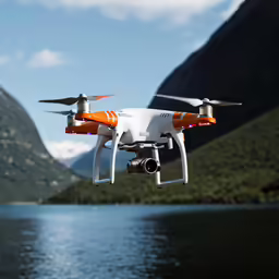 a small remote controlled aerial quadcopter flying over a lake
