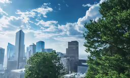 the city of seattle skyline is clear with clouds