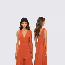 two women in orange jumpsuits, one with an open back and the other with open