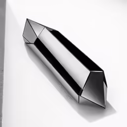 a black object is shown on a white surface