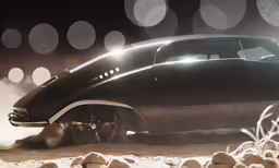an old car has a lot of dust on the ground