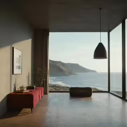 large window opens to the ocean and features wood flooring