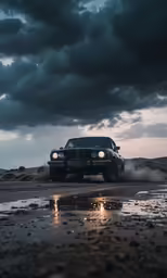 an suv with lights is driving on the sand near the water