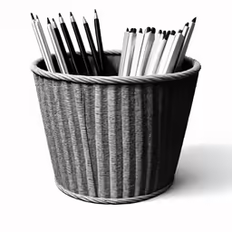 a basket holds pencils, pencils, and pens