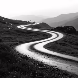 a winding road going through the mountains