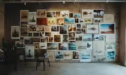 an old room has a wall full of pictures and a chair