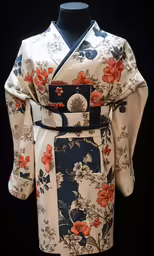 an old japanese kimono with a floral design