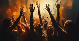 an image of group of people cheering with their hands in the air