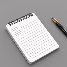 a notebook and pen sit next to each other