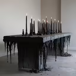 this is an altar covered in long candles
