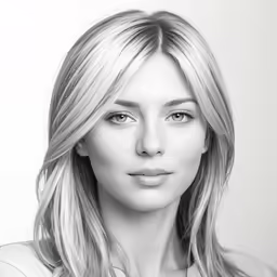a beautiful blonde female with a serious look on her face