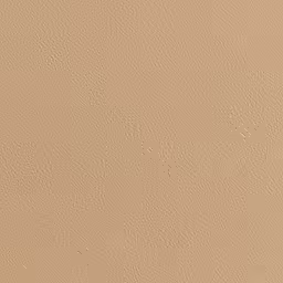 a beige background of textured sand from an angle