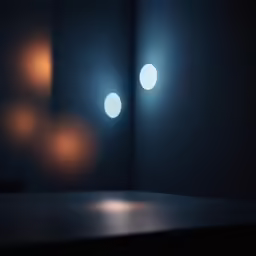 two lights that are turned on to be on some sort of lighting