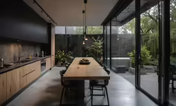 the kitchen area of a home is neatly appointed