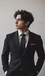 an image of a man wearing a suit and tie