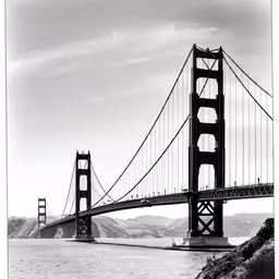 the golden gate bridge towering over the water
