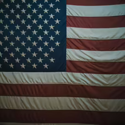 an american flag is showing the dark and bright colors