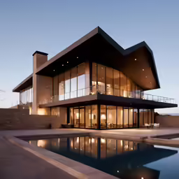a home with large windows and a swimming pool in front of it